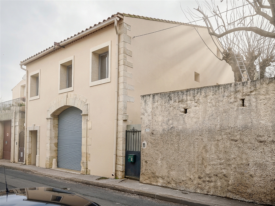 Maison de village en pierres – Le Pouget (34), façade en secteur protégé - vue après travaux